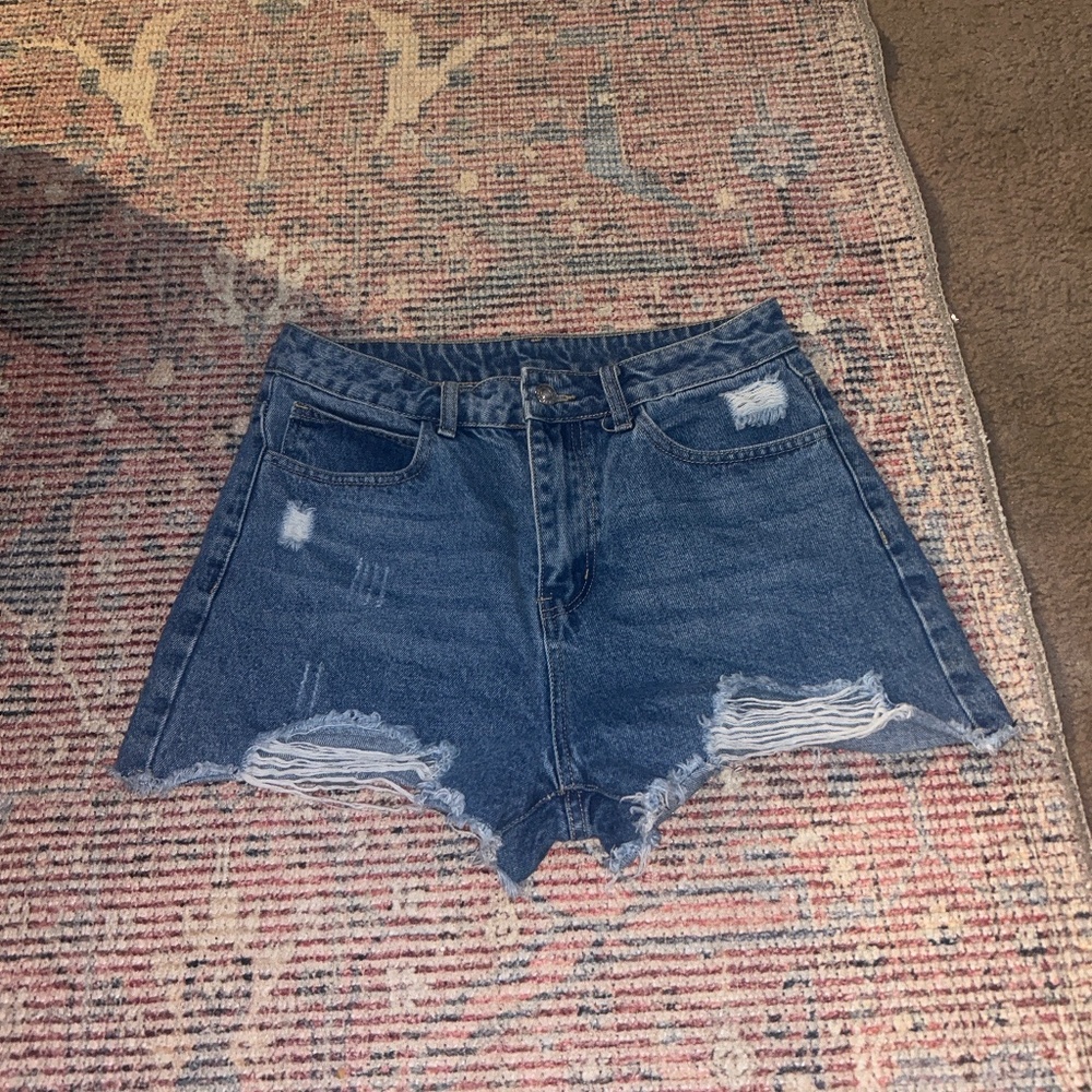 Destroyed denim jean shorts